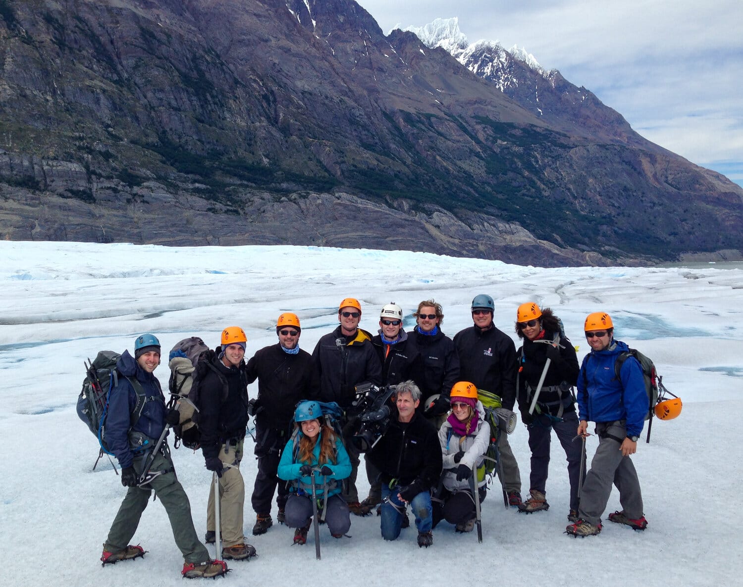 Philipp (top, center) pictured in Chile with the Moments of Happiness production crew